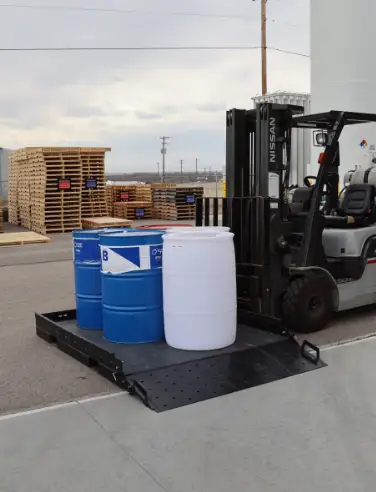 forklift skid in use with 55 gal barrels
